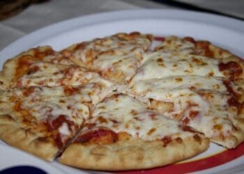 Cheeky Cheese and Tomato Pizza Recipe - TheRecipe.Website