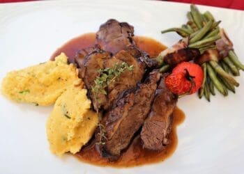Roast Lamb with Garlic Gravy Recipe - TheRecipe.Website