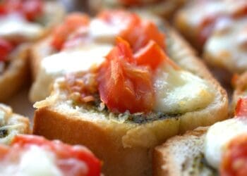 Mozzarella, Pesto and Tomato Bruschetta Recipe - TheRecipe.Website