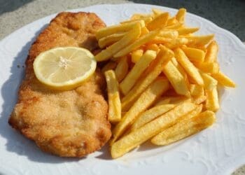 Chicken Schnitzel with Chips Recipe - TheRecipe.Website