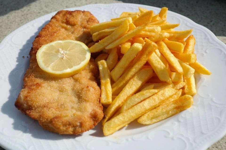 Chicken Schnitzel with Chips Recipe - TheRecipe.Website