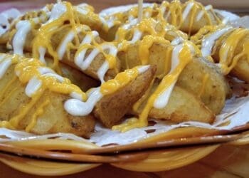 Cheesy Fried Potato Wedges Recipe - TheRecipe.Website